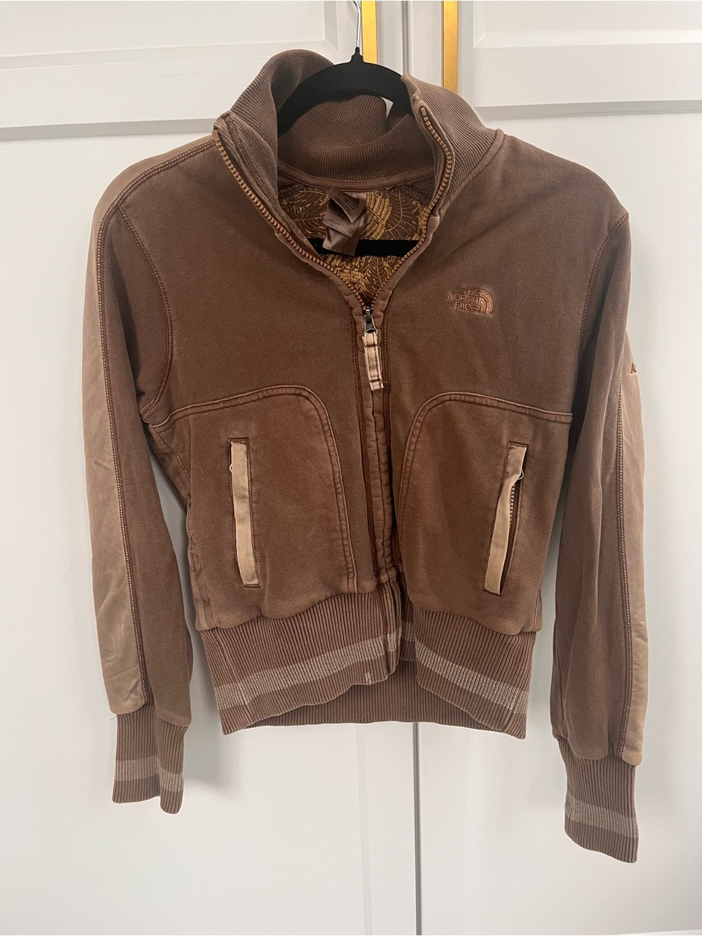 The North Face Brown Bomber-Style Zip Jacket with Aspen logo